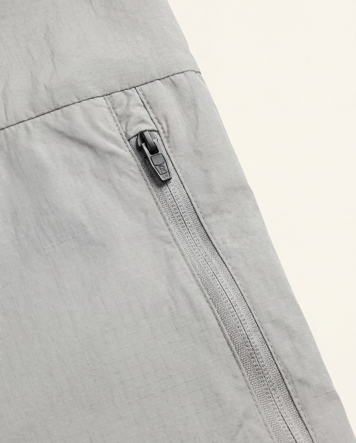 Zephyr Anti-UV Windbreaker in Pearl Grey, detail view