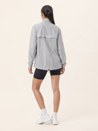 Zephyr Anti-UV Windbreaker in Pearl Grey — back detail, close-up